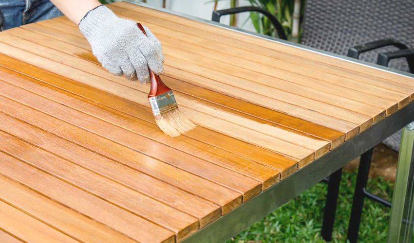 Apply Wax On The Wood Furniture